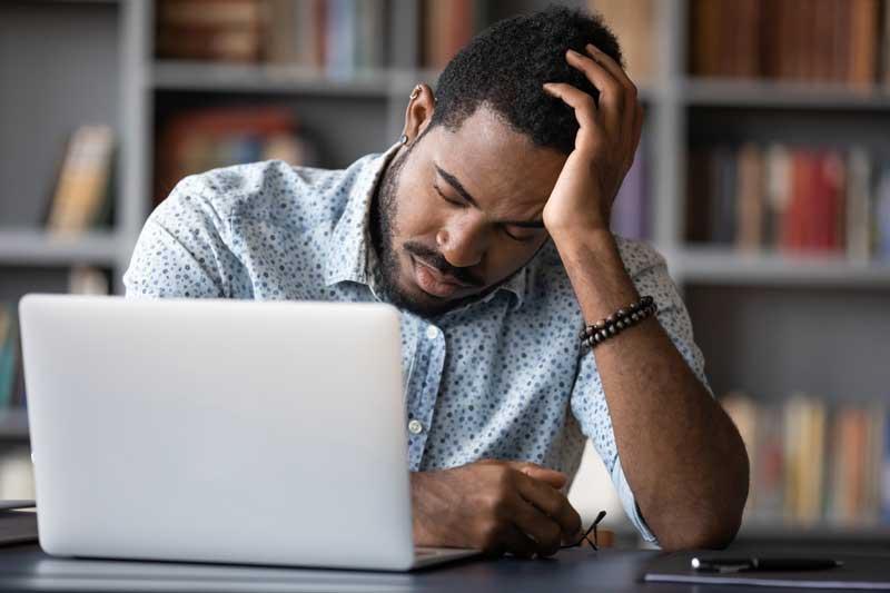 Man asleep at desk